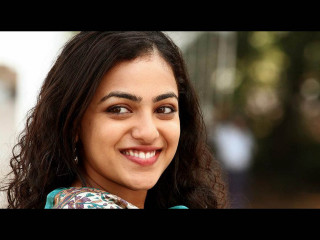 Woman long hair smiling camera 11 - movie still frame free wallpaper