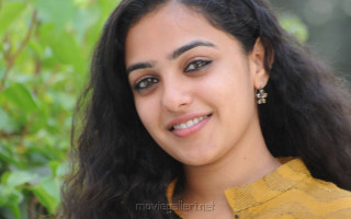 Woman longhair yellowshirt smiling greenbackground - a yellow shirt free wallpaper