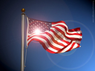 Flag flying wind blue sky - image free wallpaper