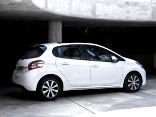 White car parking garage concrete 2 - a concrete wall free wallpaper