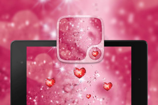 Tablet hearts floating pink background - a tablet free wallpaper