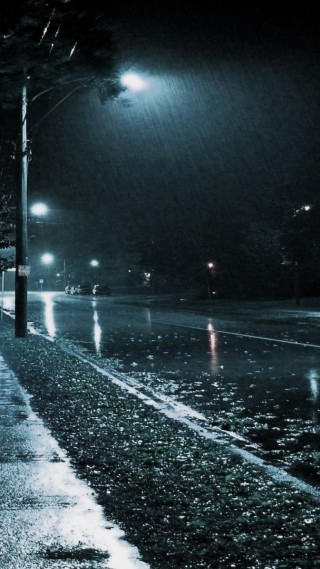 Street night person walking sidewalk - a street free wallpaper for mobile