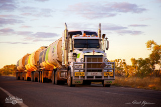 Semi truck sunset light road - a sky background and trees free wallpaper