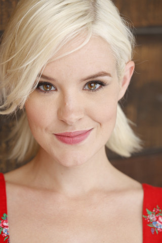 Blonde woman red dress smiling - free portrait wallpaper