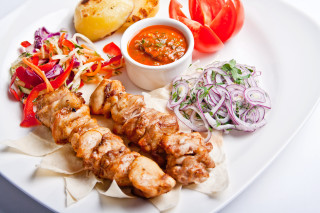 Plate of food with meat - onion free wallpaper