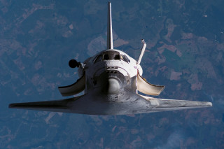 Space shuttle flying landing gear - a space shuttle free wallpaper