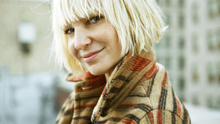 Blonde woman plaid coat smiling - plaid free wallpaper