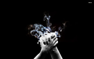 Hands holding smoke black background - art photography free wallpaper