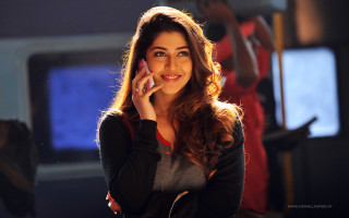 Woman talking cell phone window 2 - the floor free wallpaper