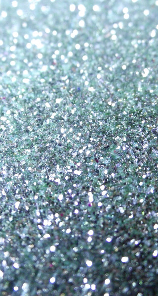 Glitter closeup background dots surface - free stars wallpaper