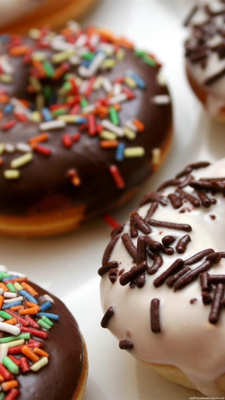 Close up variety donuts sprinkles - free valentines wallpaper