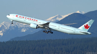 Air canada mountain range snow - over a mountain range free wallpaper