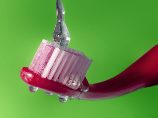 Toothbrush toothpaste scissors green background - a toothbrush free wallpaper for desktop