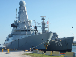 Large ship docked pier smaller - a large ship free wallpaper