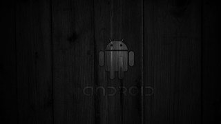 Dark wooden wall logo wooden - a logo free wallpaper