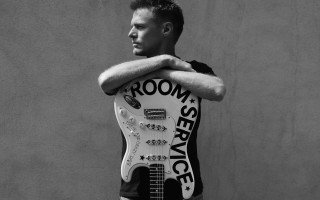 Man guitar shaped body room - a guitar free wallpaper