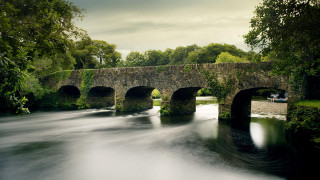 Stone bridge river man bench - romanesque free wallpaper