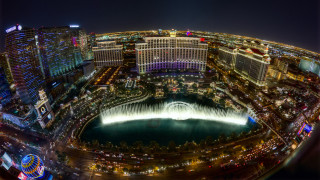 City night fountain lights buildings 2 - a view of a city free wallpaper
