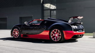 Bugatti parked building doors open - rich color free wallpaper