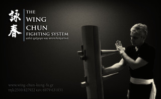 Woman handstand machine black background - a machine free wallpaper