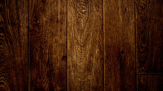 Wooden floor closeup brown background - a woodcut free wallpaper