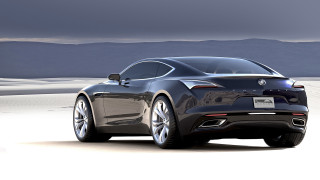 Black car desert mountains cloudy - a black car free wallpaper