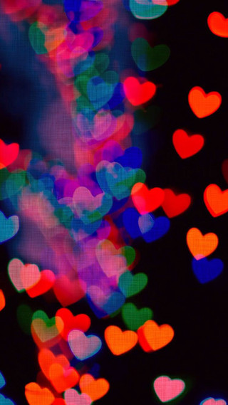 Blurry hearts dark building background - bokeh free wallpaper