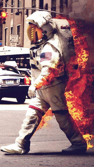 Man space suit walking street - a fireball free wallpaper for mobile