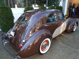 Brown white car parked building - a white fence free wallpaper