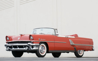 Red classic car white wall - a red classic car free wallpaper