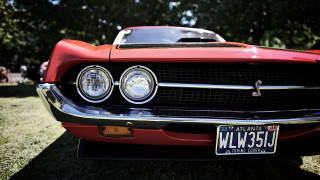 Red car license plate parked - wide len free wallpaper