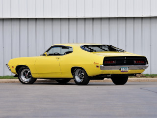 Yellow car parked building white - side profile free wallpaper