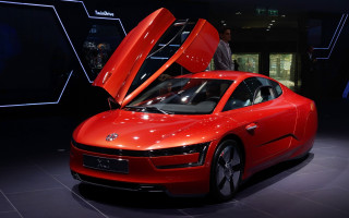 Red car hood open showroom - a showroom free wallpaper