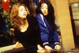 Two women motorcycle city street - free halloween wallpaper for desktop