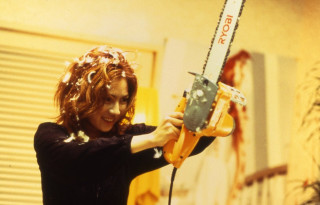 Woman chainsaw room window sign - criterion collection free wallpaper