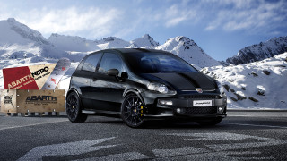 Small black car mountain range - dosso dossi free wallpaper