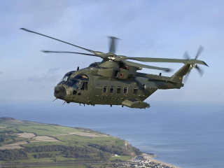 Helicopter flying water town beach - a helicopter free wallpaper