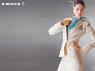 Woman suit tie posing hands - a woman in a suit free wallpaper