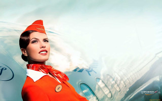 Woman orange suit hat plane - andrey ryabovichev free wallpaper