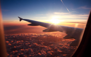 Plane wing sunset clouds view - visible free wallpaper