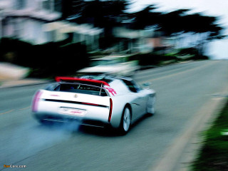 White car green hillside tiltshift - a lush green hillside free wallpaper