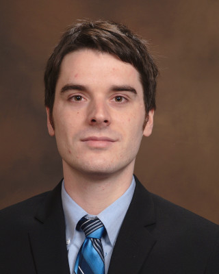 Man suit tie posing picture 8 - a portrait free wallpaper for mobile