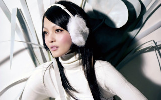 Woman blackhair headphones white turtleneck - headphone free wallpaper