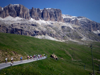 Biking group mountain snowy road - a road in front free wallpaper