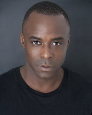 Man black shirt serious look 2 - harlem renaissance free wallpaper for mobile