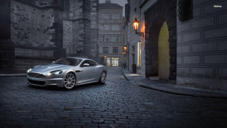 Silver car cobblestone street city - a silver car free wallpaper