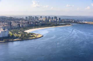 Aerial city beach bridge skyline - a beach in the foreground free wallpaper