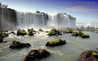 Waterfall large water rocks foreground - alain tasso free wallpaper