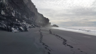 Beach rock cliff footprints sand - unreal engine free wallpaper for desktop