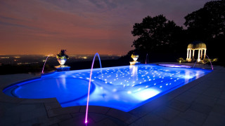 Pool fountain lights night city - a fountain free wallpaper